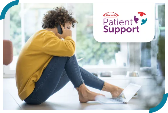 A patient sitting on the ground talking on the phone, with a Takeda Patient Support logo on the top right corner.